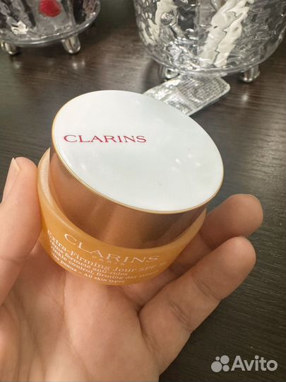 Пустые баночки от крема Clarins