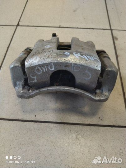 Суппорт тормозной передний правый Kia Rio 4