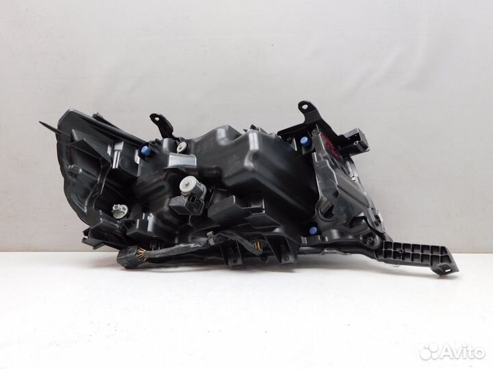 Фара левая Toyota Land Cruiser