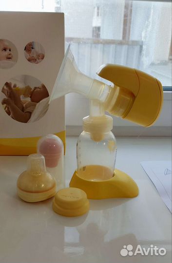 Молокоотсос medela электрический