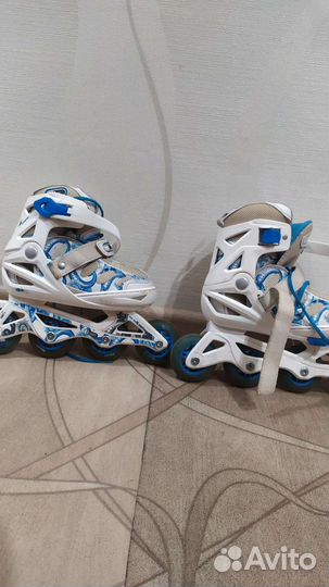 Роликовые коньки