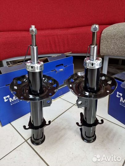 Передние стойки Opel Corsa C