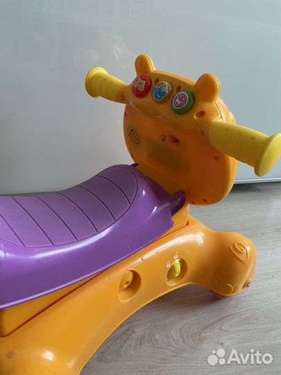 Игрушка бегемот-каталка толокар музыкальный