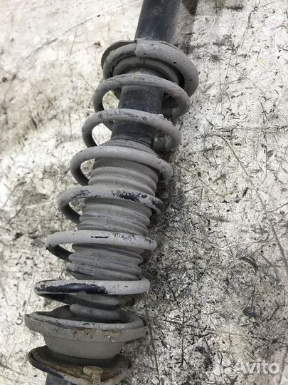 Амортизатор передний левый Nissan March