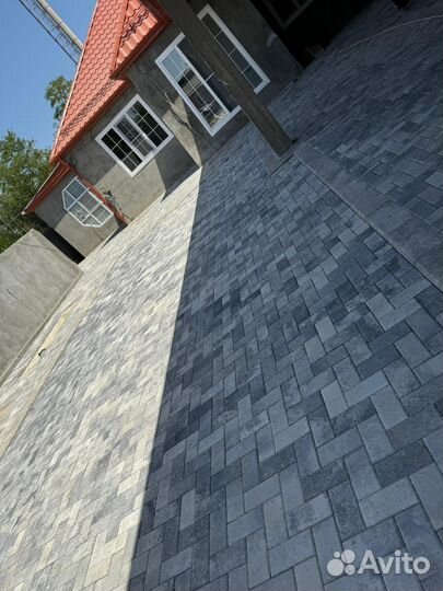 Укладка тротуарной плитки брусчатки