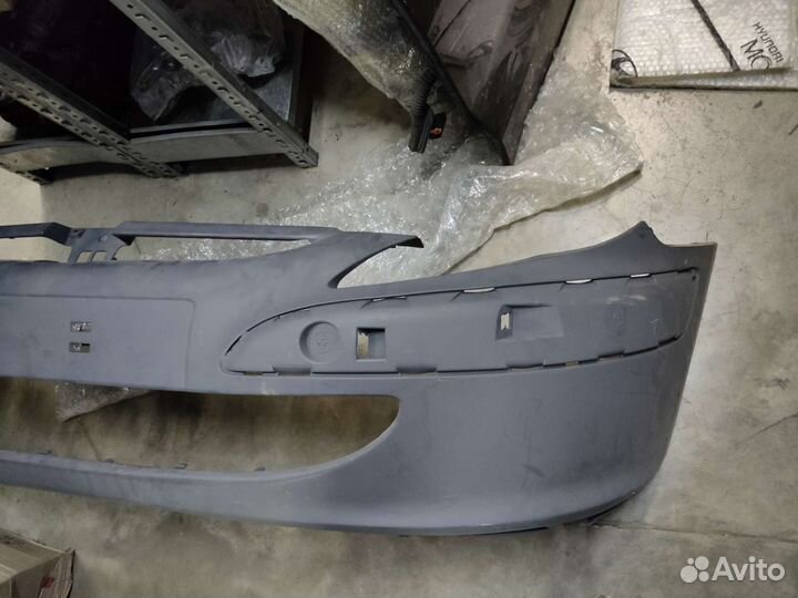 Бампер передний Peugeot 307 новый оригинал