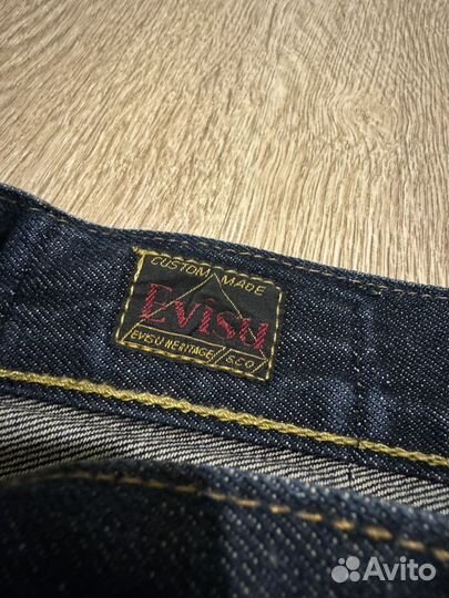 Джинсы Evisu