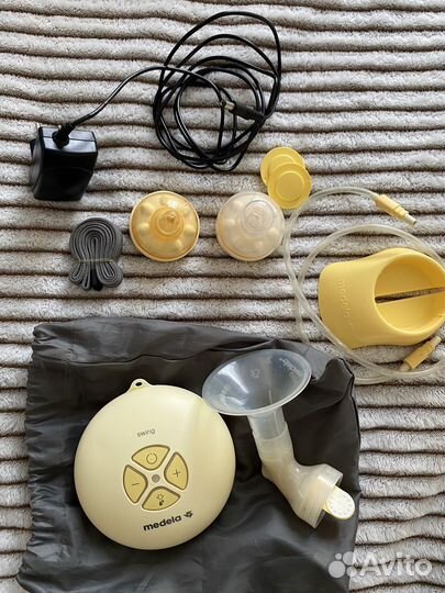 Молокоотсос medela swing
