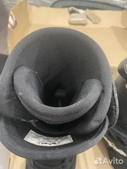 Ботинки для катание на снегоходе