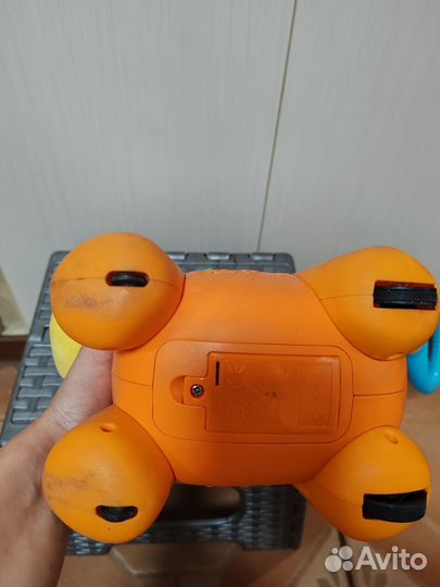 Игрушка каталка с ручкой