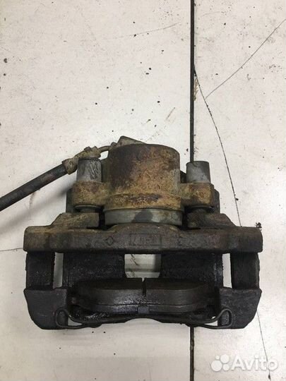 Суппорт тормозной передний левый Ford Fusion