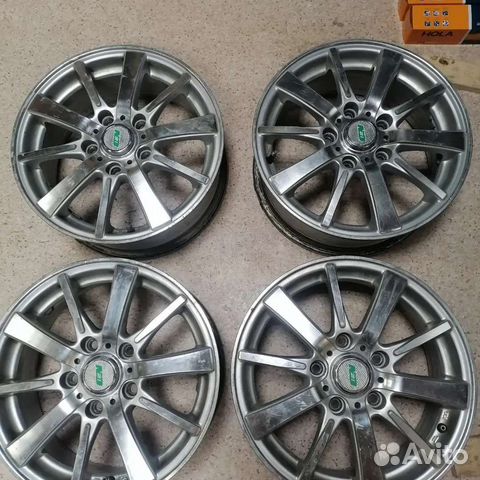 Продам комплект литых дисков 15 радиуса