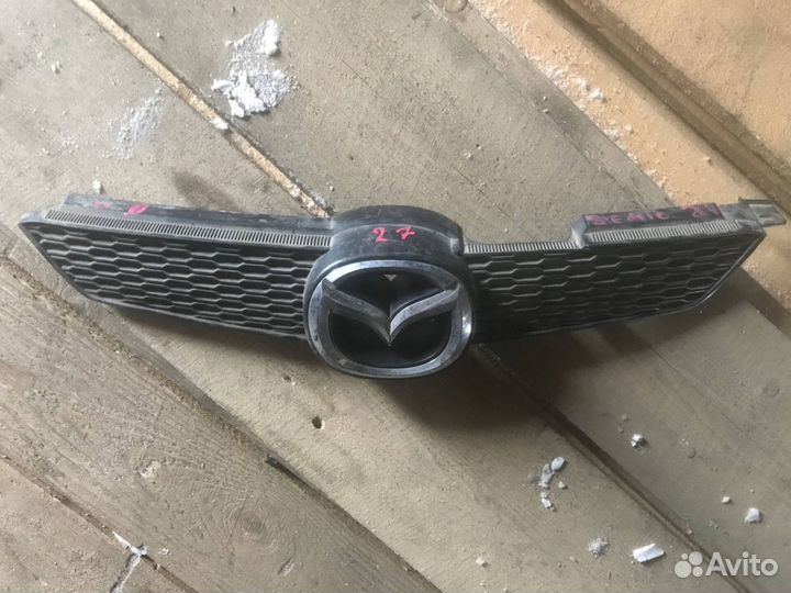 Решетка радиатора Mazda Demio DY
