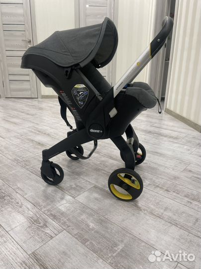 Коляска автокресло doona plus с базой изофикс