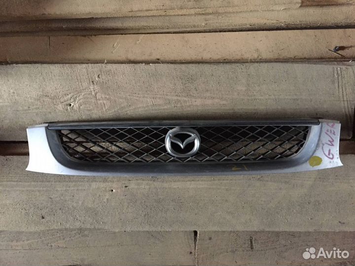 Решетка радиатора Mazda Capella GW 1999г