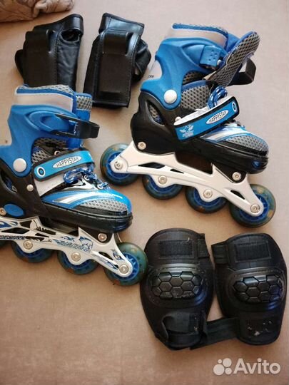Роликовые коньки