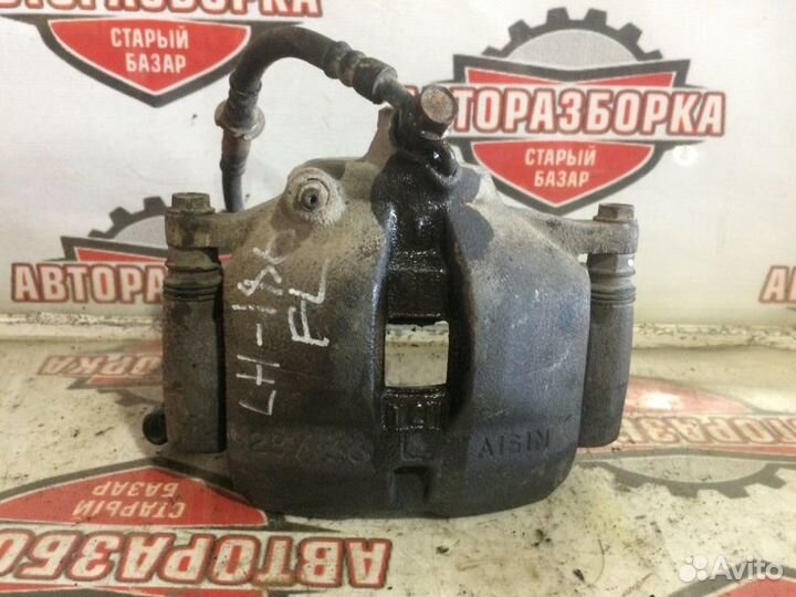 Суппорт тормозной передний левый Toyota Hiace