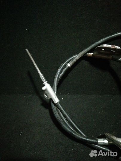 Трос стояночного тормоза (центральный)