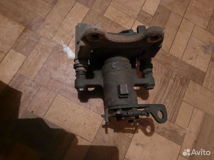 Тормозной суппорт Рено Сценик 2 Renault Scenic