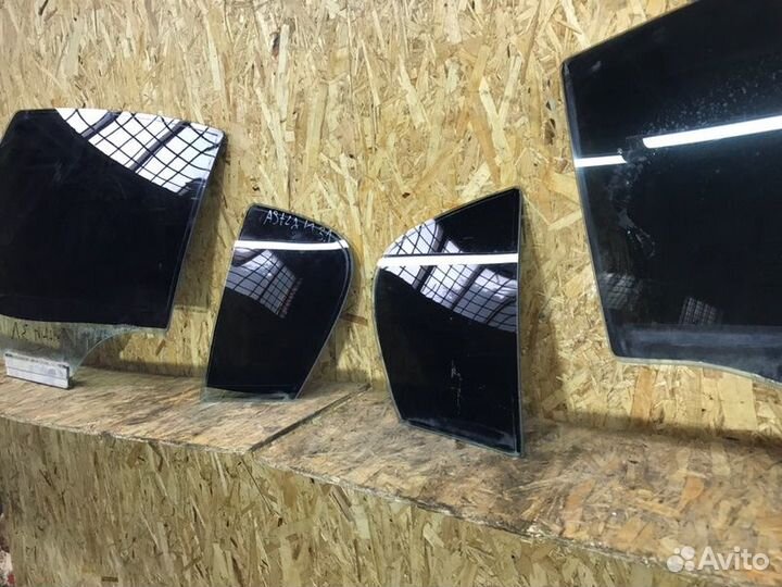 Стекло двери заднее правое Opel Astra H седан 1.6