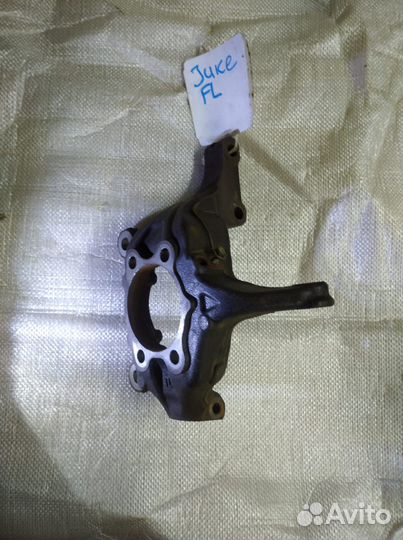 Кулак поворотный передний Nissan Juke F15