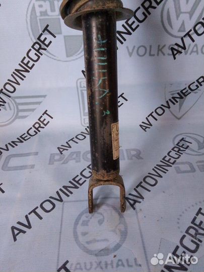 Стойка амортизатор задняя левая Chevrolet Epica