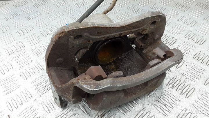 Суппорт передний левый Kia Soul рест. 2012