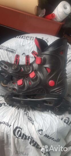 Роликовые коньки