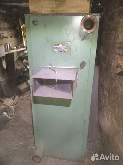 Котел отопительный твердотопливный и газовый