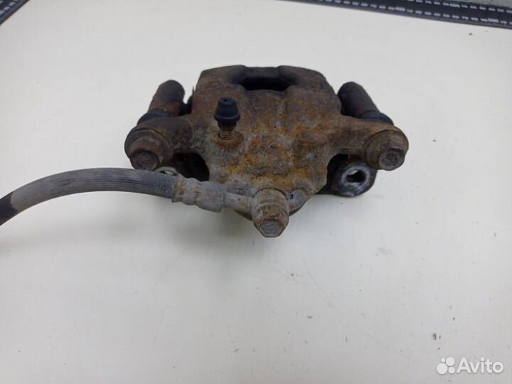 Суппорт тормозной задний правый Nissan Tiida