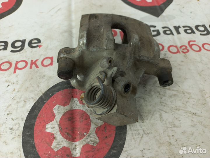 Суппорт задний правый Ford Focus 2 Mazda 3bk Форд