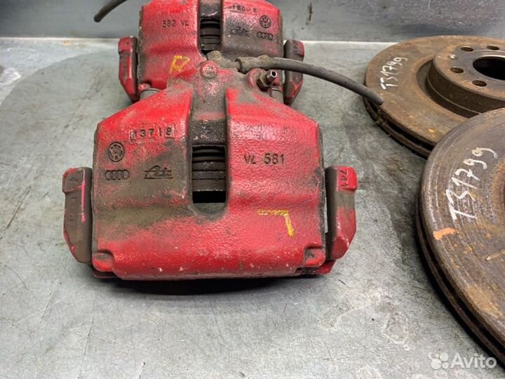 Суппорт тормозной задний левый Skoda Octavia (A5