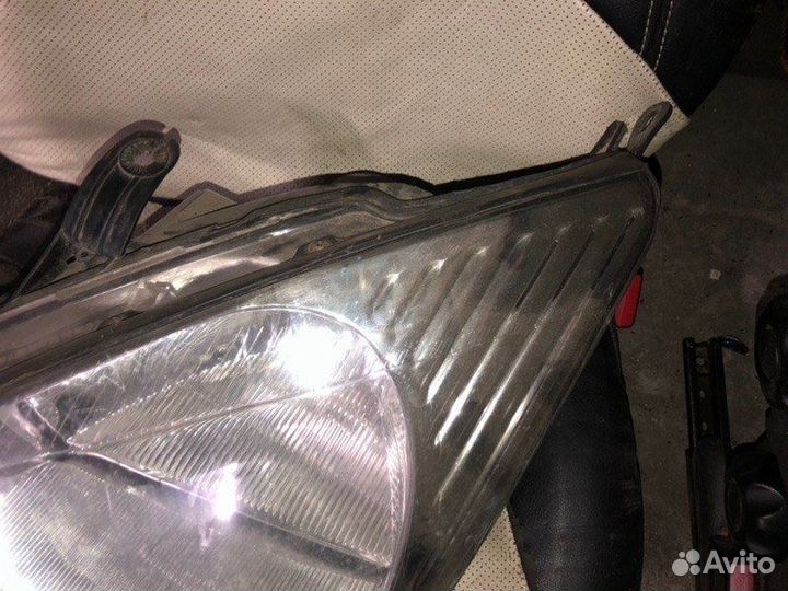 Фара левая Ford Focus 1