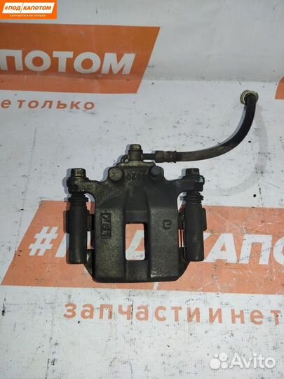 Суппорт тормозной задний правый Nissan X-Trail T31