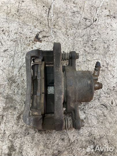 Суппорт тормозной передний левый Hyundai Sonata