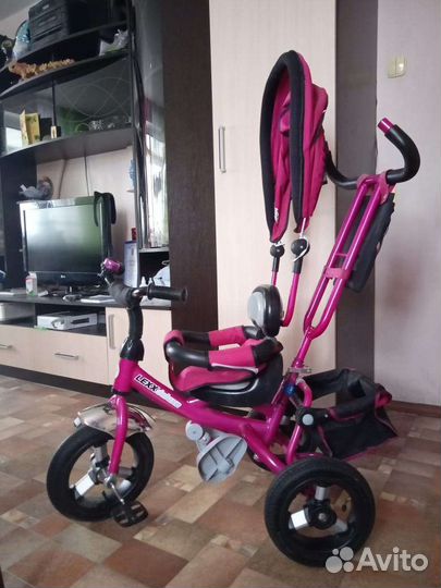 Трехколесный велосипед с ручкой