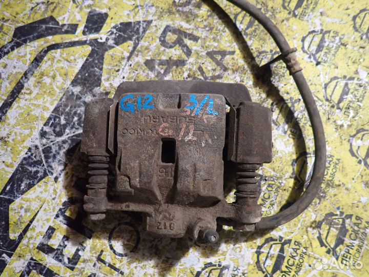 Суппорт тормозной задний левый Subaru Impreza g12