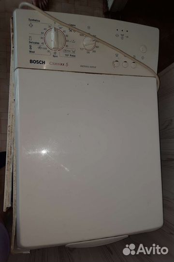 Стиральная машина с вертикальной загрузкой