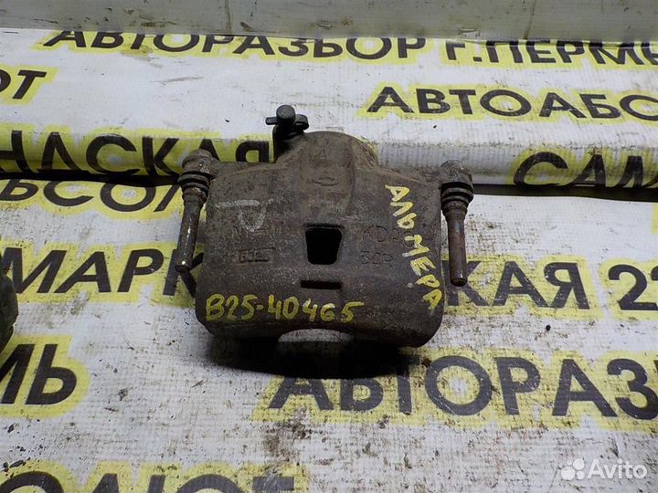 Суппорт передний правый Nissan Almera (N16) 2000