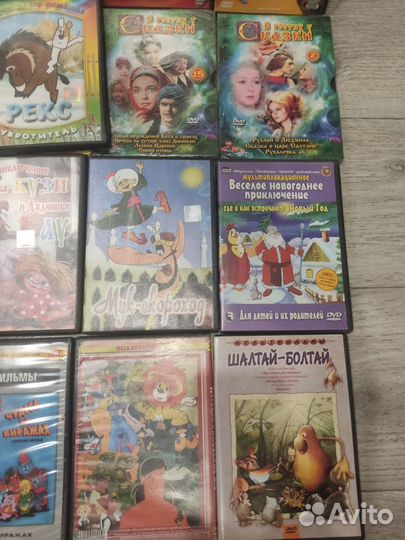 18 DVD дисков с мультиками за 1кг конфет