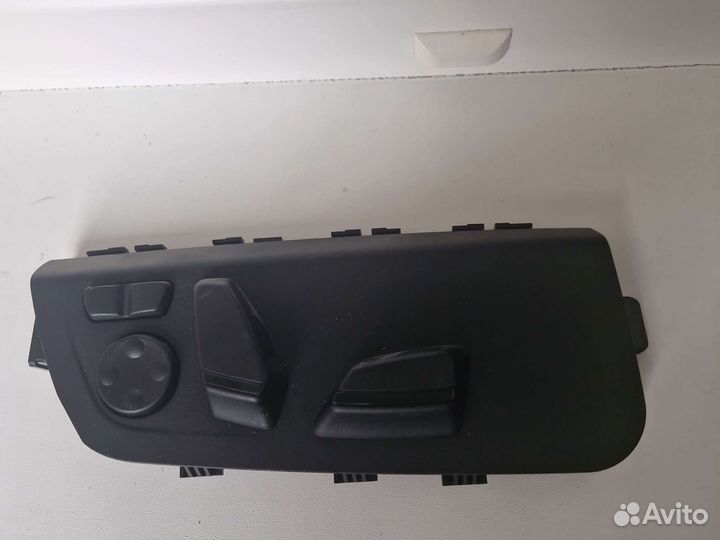 Переключ.регулир.сиденья пер.пассажира