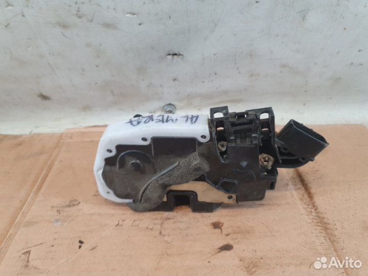 Замок двери передний левый Nissan Almera G15