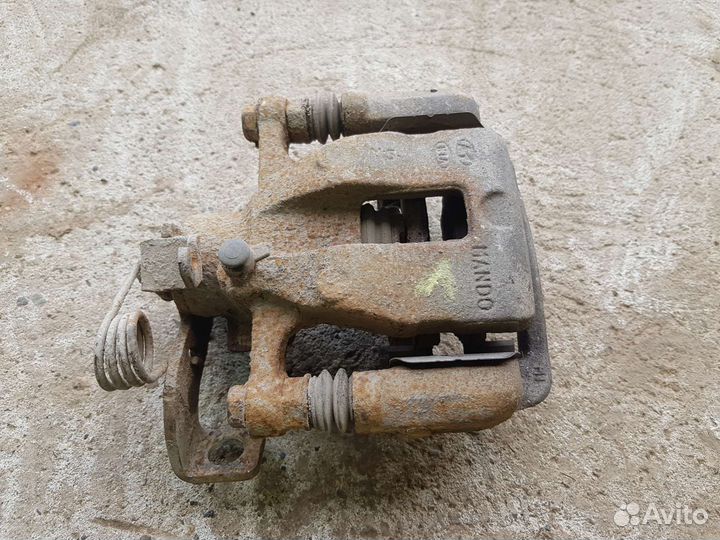 Суппорт задний левый kia rio 3