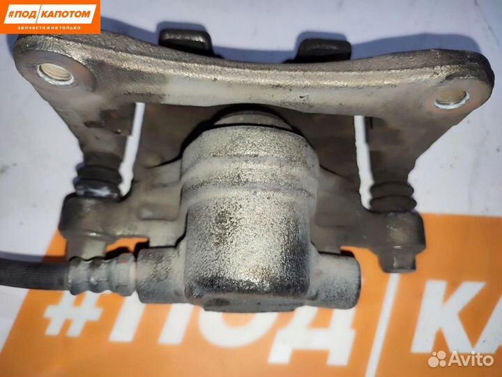 Суппорт тормозной задний левый Mitsubishi Lancer