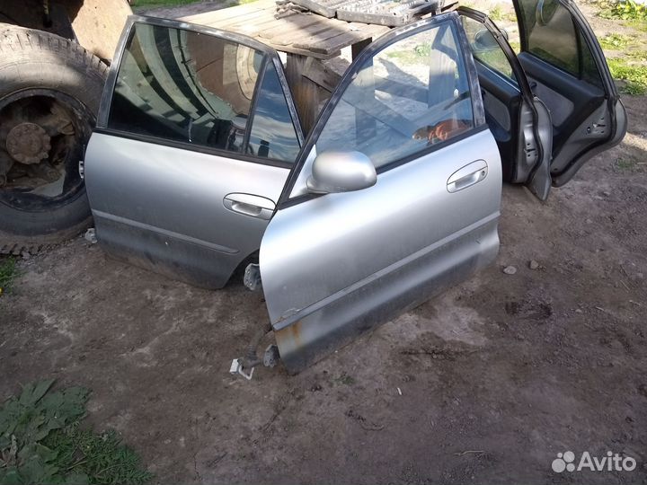 Двери на митсубиси