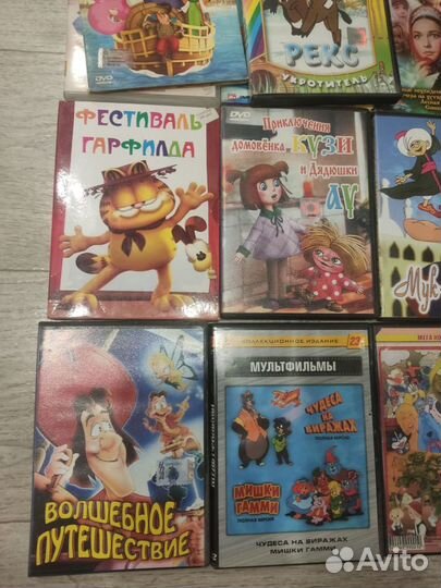 18 DVD дисков с мультиками за 1кг конфет