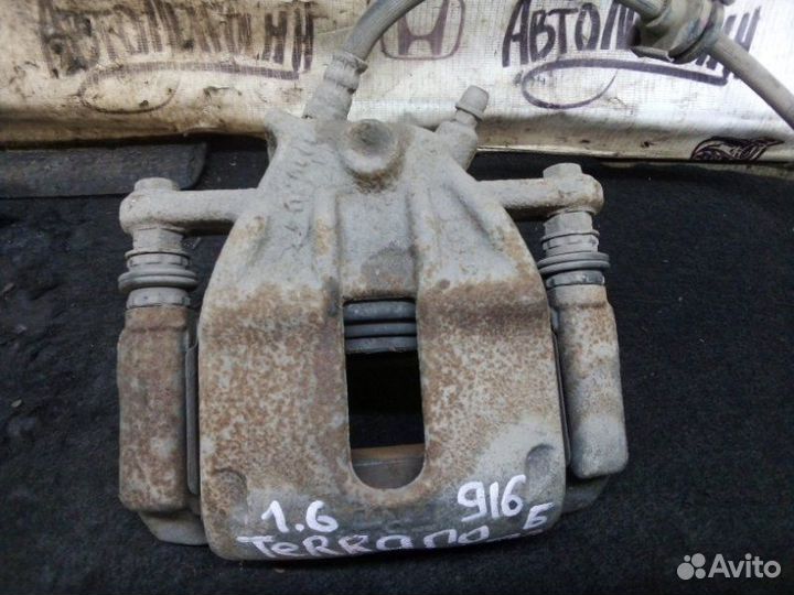 Суппорт передний левый Nissan Terrano H4MD438 2016