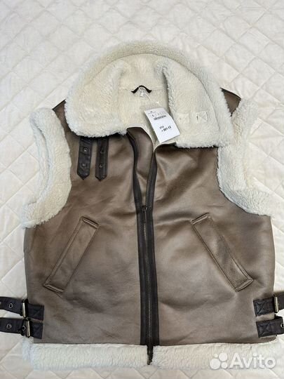 Жилетка женская