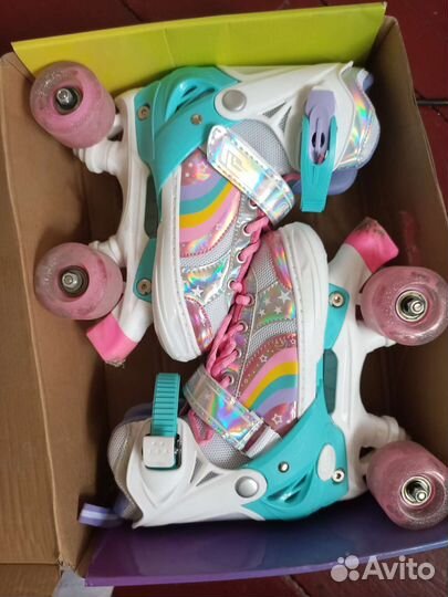 Роликовые коньки