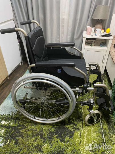 Инвалидная коляска